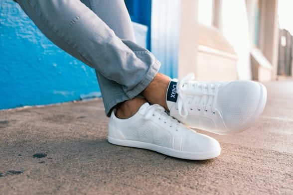 Xero Shoes Dillon valged tumesinine logo vegan tekstiil tennised paljajalujalanõud