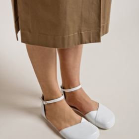 Shapen Poppy white classic all-white barefoot sandals.